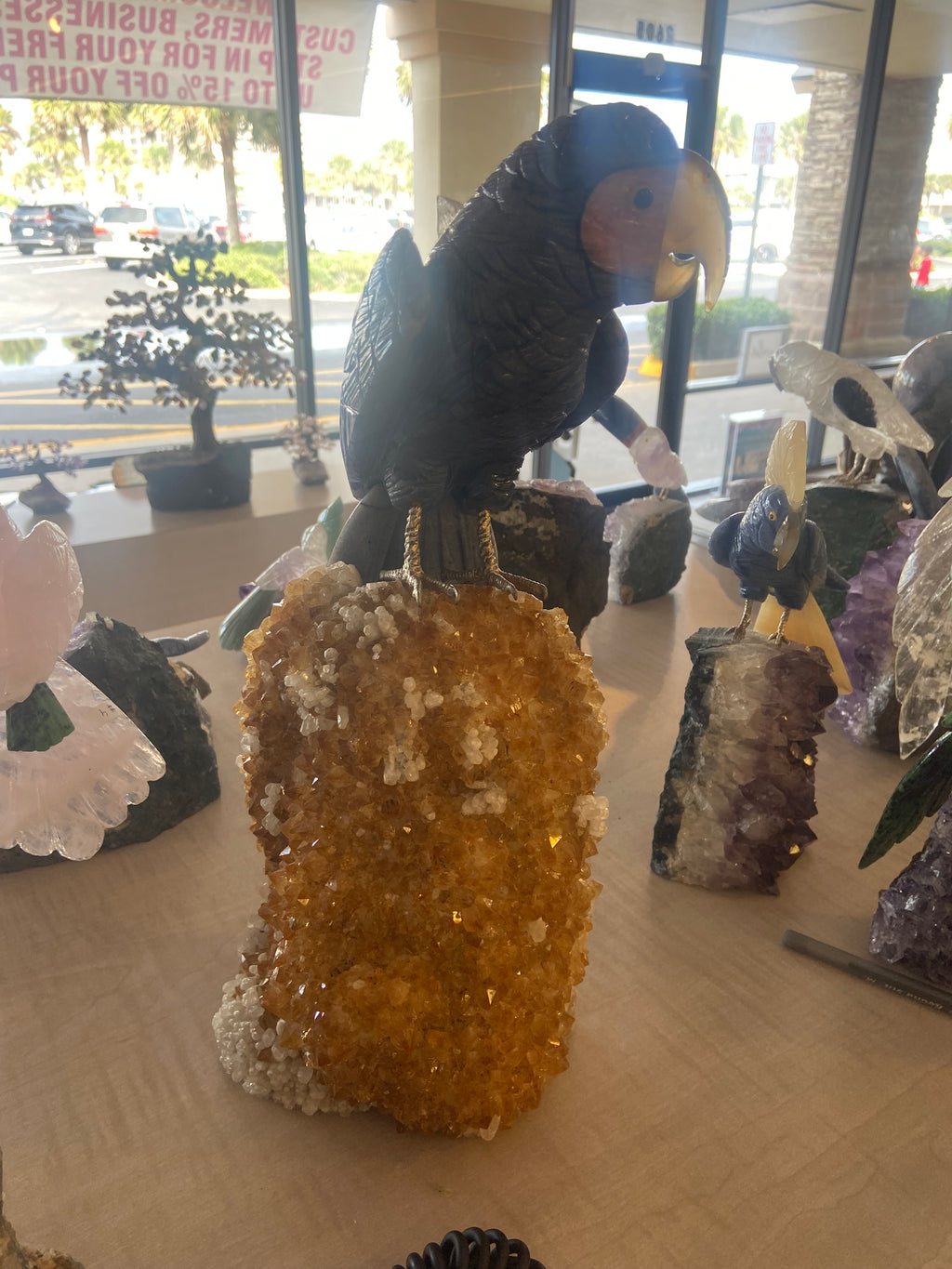 Hand-Carved Blue Crystal Parrot on Amethyst